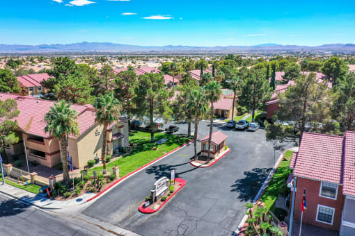 an aerial view of a neighborhood with houses and trees