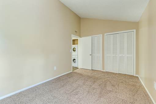 Empty room with carpeted floors at The Place at Davis Islands, Florida