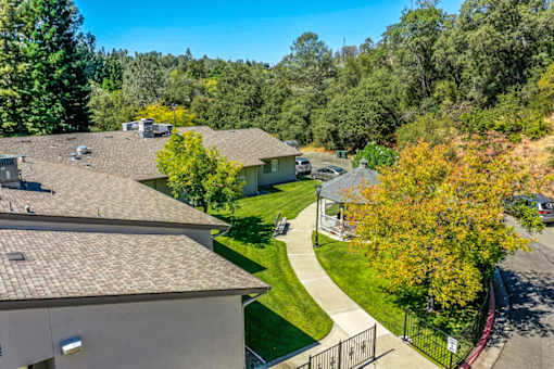 A residential area with houses and trees.