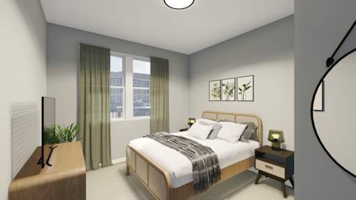 A bedroom with a large bed and a window with curtains.