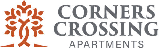 A logo for Corner Crossing Apartments with a tree graphic.