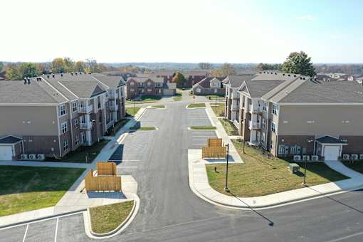 an aerial view of a row of houses on a street