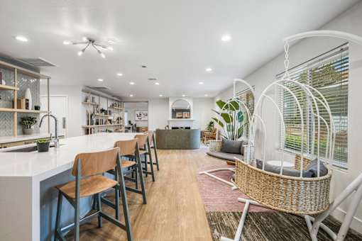 a living room with a kitchen and a dining room at Citrine Hills, California