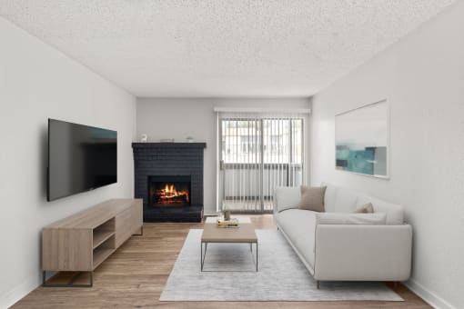 Furnished Living Room with Fire Place at South Lamar Village Apartments in Austin, TX 78704