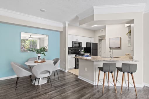 Kitchen and Dining Table at Verona at Boynton Beach Apartments in Boynton Beach, FL 33426