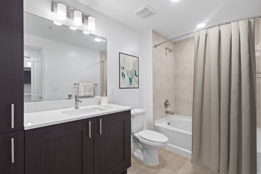 a bathroom with a sink toilet and a shower at One Plantation in Plantation, Florida 33324