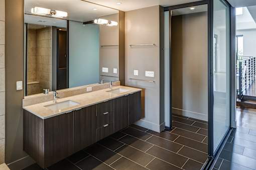 Bathroom with a Double Sink at Misora Apartments, San Jose, CA