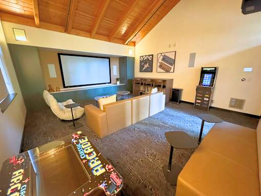 A room with a brown carpet and a wooden ceiling at The Lakes in Bellevue, Washington