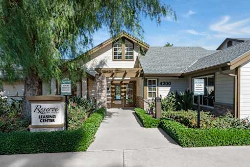 The Reserve Leasing Center is a two-story building with a welcoming entrance.