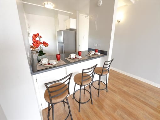 view of a kitchen and chairs at Waikele Towers, Waipahu, 96797