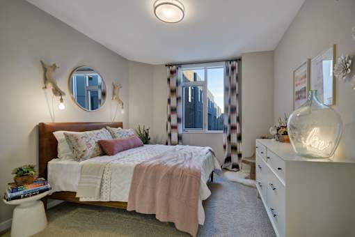 a bedroom with a bed and a window at L Seven, San Francisco, California 94103