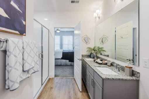 a bathroom with a sink at The Merchant Apartments, Charleston, SC