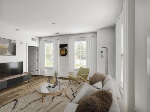 a living room with a couch and a tv at The Merchant Apartments, Charleston, SC, 29403