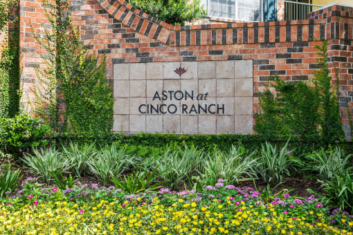 the sign in front of a brick wall at Aston at Cinco Ranch, Katy, TX, 77450