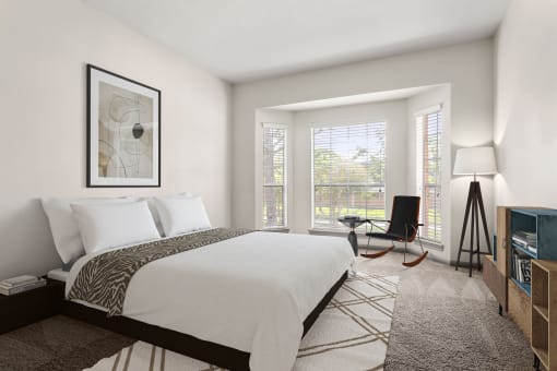 a bedroom with a large bed and a window at Aston at Cinco Ranch, Texas