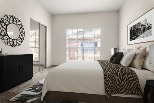 a bedroom with a large bed and a window at Aston at Cinco Ranch, Katy, TX, 77450