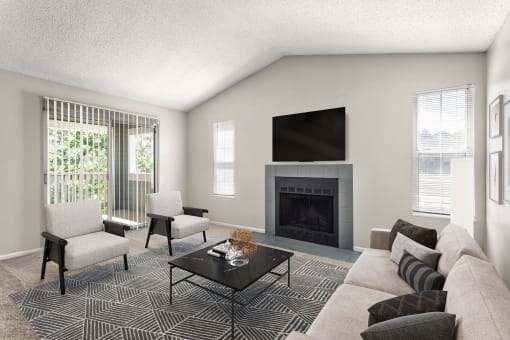 a living room with a couch and chairs and a fireplace at Arcadia Apartments, Centennial, 80112