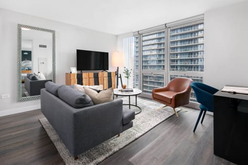 Living rooms filled with natural light at Shoreham and Tides Apartments, Chicago, Illinois