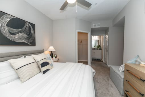 a bedroom with a large white bed and a ceiling fan at Willowest in Lindbergh, Atlanta, Georgia