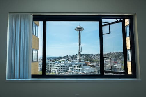 A view of the Space Needle from a window at Skye at Belltown Apartments, Seattle, WA