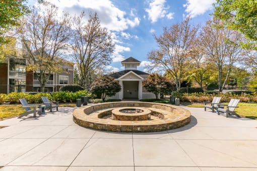 courtyard with a fire pit and benches at Roswell Village, Roswell, GA