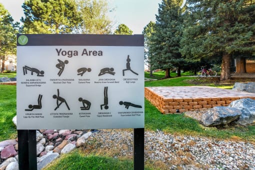 a sign that reads yoga area in a park at Verdant, Colorado, 80303