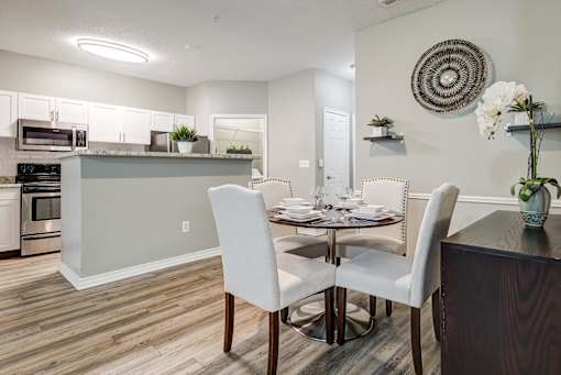 Open concept dining room and kitchen at Wyndchase Aspen Grove Apartments, Franklin, Tennessee