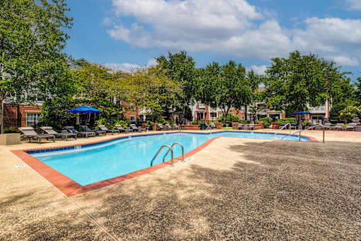 Outdoor swimming pool with red brick trim at Wyndchase Aspen Grove Apartments, Franklin, TN