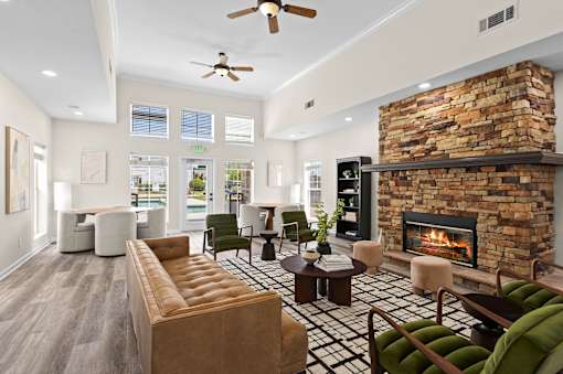 A living room with a fireplace and a couch.