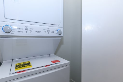 a white washer and dryer in a laundry room at Tides at Mesa, Arizona