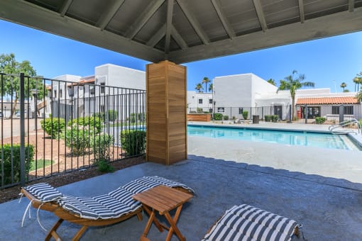 our apartments have a large pool and lounge chairs at Tides at Mesa, Mesa