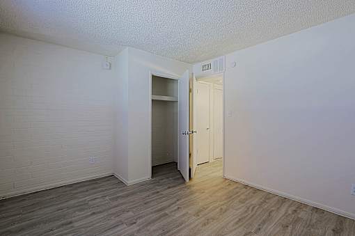 Bedroom with Closet at Ambassador West Apartments, Phoenix, AZ