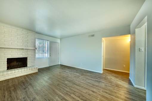Room with a fireplace at Connect on University, Mesa, AZ, 85203