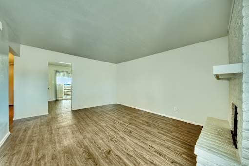 Unfurnished room with wooden flooring at Connect on University, Mesa, AZ