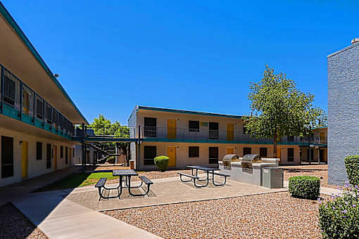 Courtyard with picnic tables at The Link Apartments, Mesa, 85201