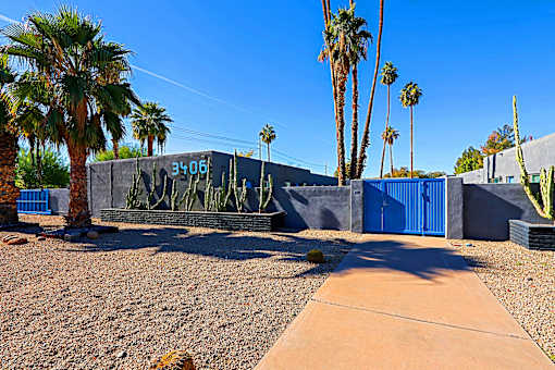 A concrete wall with the number 3506 on it.