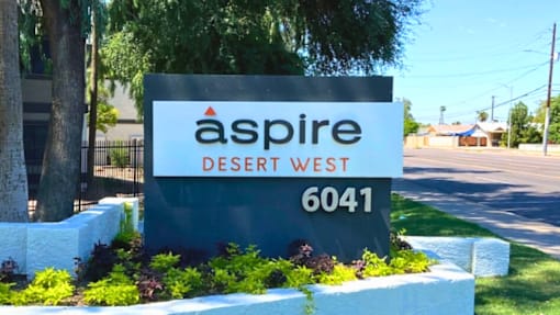 A sign for Aspire Desert West with the number 6041 on it.