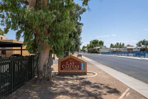 orange sign "Las Casitas" with 4444 in blue on the side