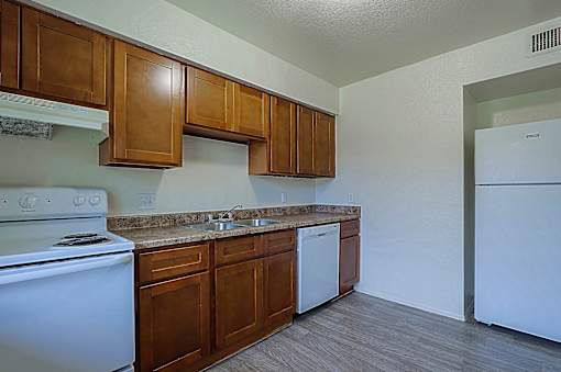 Kitchen with Cabinets at Sahuaro West Apartments, Phoenix, Arizona