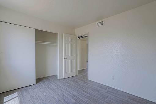 Room with attached closet at Sahuaro West Apartments, Phoenix