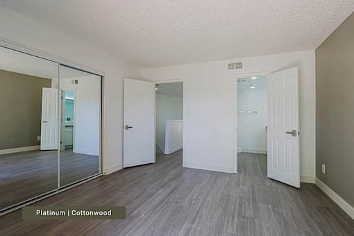 A room with platinum and cottonwood flooring.