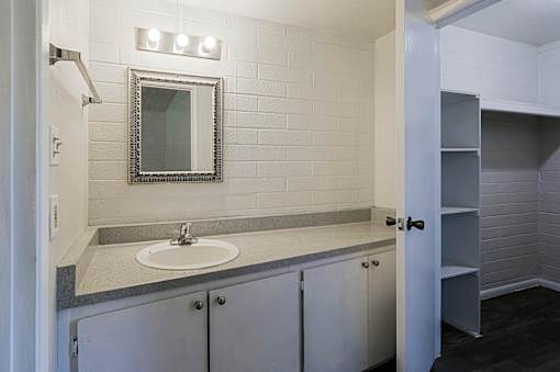 Bathroom with granite countertop at The Link Apartments, Arizona, 85201