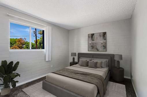 Bedroom with a window at The Link Apartments, Mesa, AZ