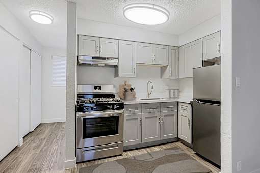 Kitchen with stainless steel appliances at The Link Apartments, Mesa, AZ, 85201