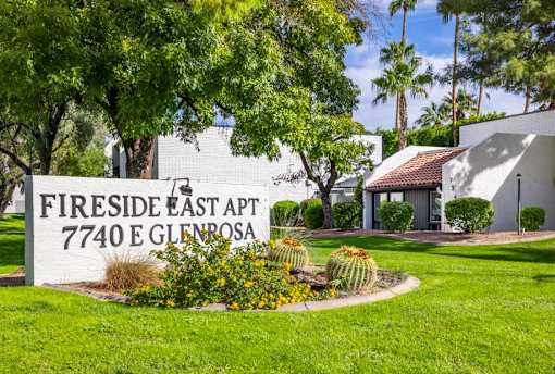a sign for Fireside East apartments