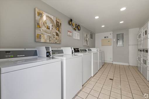 the laundry room is equipped with washes and dryers