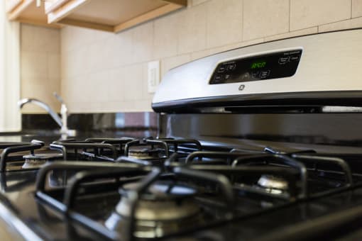 close up of gas range at 2701 Connecticut apartments in washington dc
