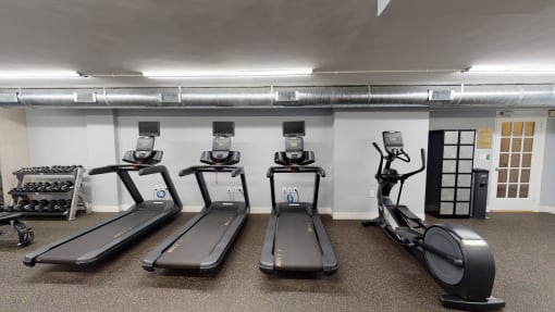 fitness center with cardio machines at 2800 woodley apartments in washington dc