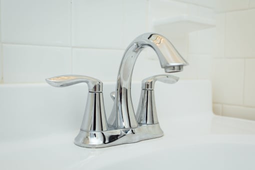 close up of bathroom sink faucet at 2801 pennsylvania apartments in washington dc