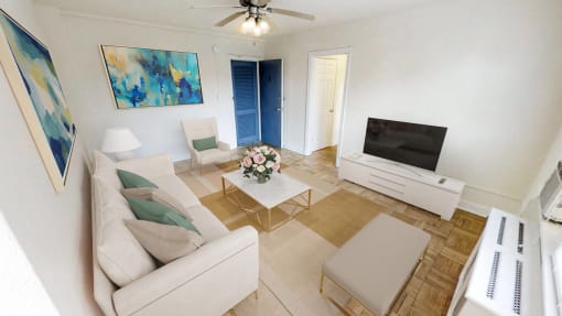 a living room with a couch and a tv